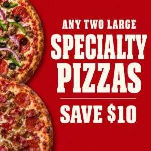 Two large specialty pizzas are shown on a red background with text offering a $10 savings on any two large specialty pizzas.