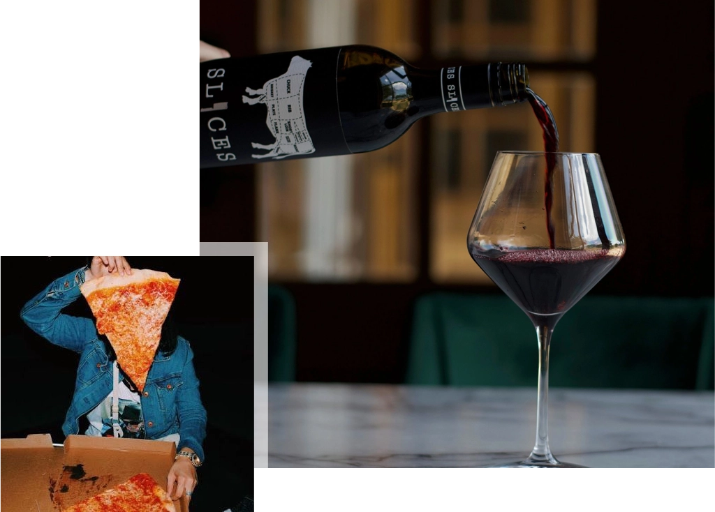 A person pouring wine into a glass with pizza in the background.